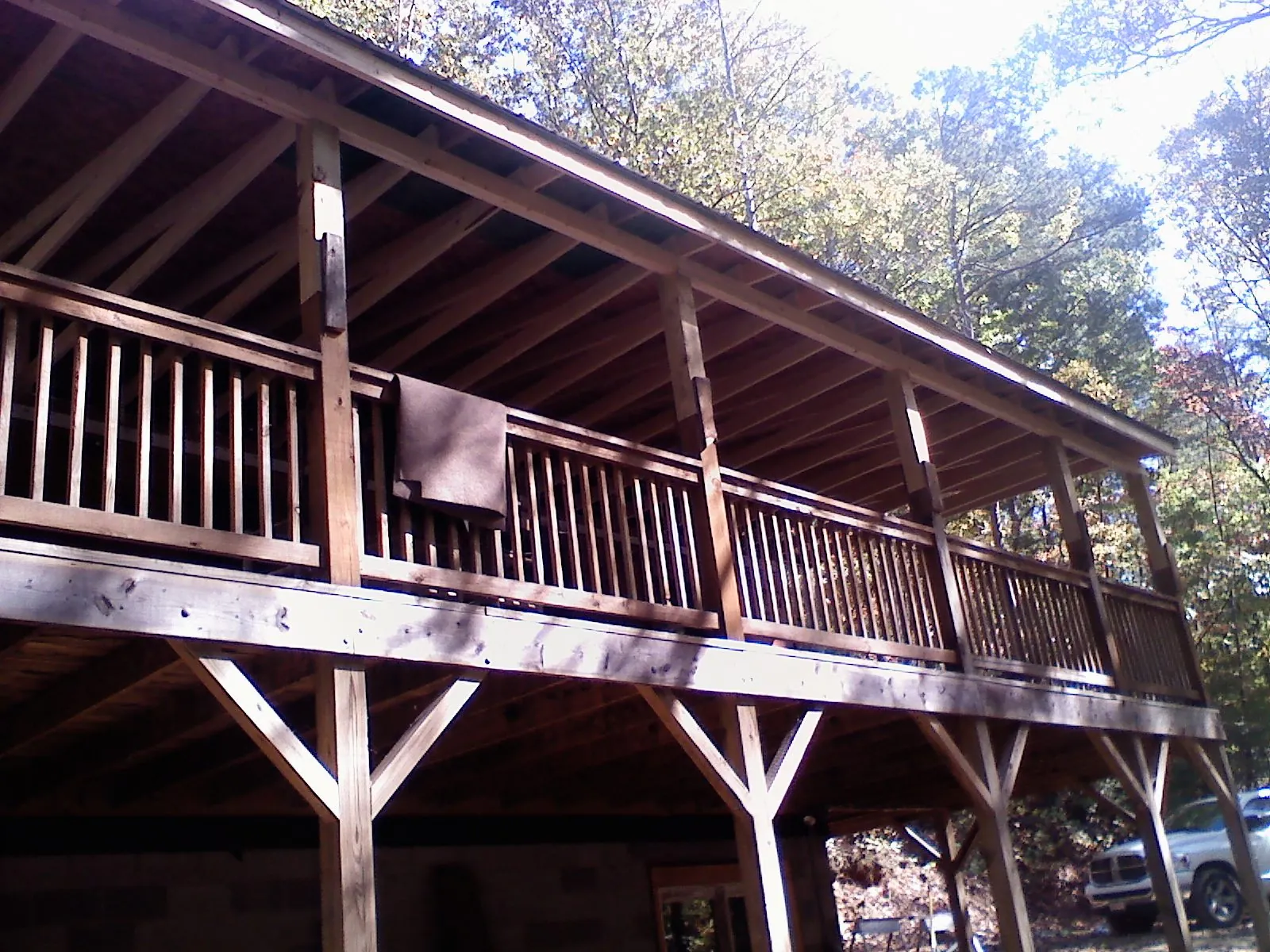 Timber framing under a new elevated porch and deck — Roof Leak Repair in Derry by Roofing Brothers